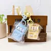 Máquina de Lotería Mini Sanrio Creativa Tamaño de Palma Llavero de Mochila Colgante de Anime Regalo para Niños Juguete Transfronterizo Al por Mayor