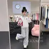 Conjunto de dos piezas de moda coreana estilo universitario, personalidad moderna, cuello polo, sudadera, pantalones casuales de pierna ancha a cuadros para niñas en primavera y otoño