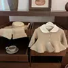 Ropa de punto festiva para niños 2026 Estilo Año Nuevo Coreano Bebé Estilo Chanel Cuello de Muñeca Suéter de Moda para Niñas