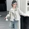 Ropa exterior de primavera y otoño para niñas 2026 nuevo estilo coreano de moda casual conjunto de dos piezas de chaqueta de primavera y jeans para niñas