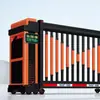 Fábrica de porta de correr seccionada elétrica unidade governamental e empresarial porta reta trilho de liga de alumínio porta de correr sem trilho porta inteligente de pátio industrial