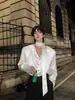 Camisa de cuero de manga larga para hombre de la marca trendy Yang Yifan, nueva colección primavera 2026 estilo coreano casual trendy negra para otoño