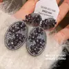 Aretes Ovalados de Circonita con Forma de Flor, Aretes de Moda Estilo Corte Vintage, Aretes de Lujo Ligero de Gama Alta con un Diseño Único