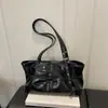 Bolsa de axila Modelo Nuevo Primavera 2026, Gran Capacidad para Viajes Diarios Color Sólido Estilo Coreano Vintage Diseño de Nicho Bolso de Hombro Tote