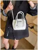 Bolsa Saco Casual da Moda 2026 Nova Coleção Primavera Estilo Retrô Textura Única Bolsa de Ombro Único Alto Valor para o Dia a Dia Bolsa Quadrada Pequena de Mão