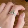Anillo Nuevo Vintage de Pluma y Libélula con Acentos Dorados, Diseño de Moda Unisex, Anillo Ajustable para Hombres, Transfronterizo