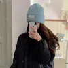Chapéu de Tricô Grosso Versátil Estilo Coreano para Outono e Inverno com Proteção para Orelhas e Touca para Aquecimento