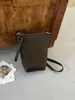 Bolso tipo cubo de cuero mate retro para mujer, nueva colección otoño/invierno 2026, bolso pequeño para teléfono, bolso de hombro ligero y sencillo