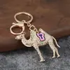 Llavero creativo de camello del desierto lindo y colorido con incrustaciones de diamantes y goteo de aceite, colgante de animal para coche, llavero, accesorio metálico