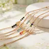 Pulsera de concha tejida con rafia transfronteriza, estilo vacación en la playa, cordón ajustable, accesorio de mano multicolor, al por mayor en stock