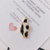 Accesorios DIY al por mayor otoño e invierno Nuevo temperamento aleación cuero de leopardo gráfico irregular pendientes colgantes accesorios