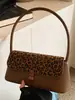 Bolso de axila vintage de nicho para commuting para mujer, Nuevo bolso de hombro con estampado de leopardo 2026, Bolso de mano moderno y único