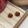 Aretes Geométricos Rojos Ankela Festivos de Año Nuevo Nicho Temperamento Venta Caliente Aretes de Botón Otoño/Invierno 2026 Venta al por Mayor de Pendientes