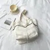 Moda Nova Primavera 2026 Bolsa de Tricô Tecida de Ombro Único Grande Capacidade Malha Vazada Bolsa Tote Estilo Ins