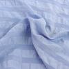 Tela seersucker teñida de doble rociado hecha a medida tela poliéster mate textil para el hogar ropa de cama tela de cuatro piezas tela para almohadas