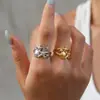 Anel com um toque de nicho de alta qualidade, aço inoxidável, estilo ins de luxo leve, design de estrela-do-mar e concha, anel aberto ajustável, atacado transfronteiriço