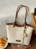 Elegante bolso tote, bolso de mujer de gran capacidad, nuevo bolso de hombro de moda para otoño 2026, bolso de mano versátil