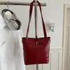 Bolso de cubo popular estilo coreano de este año para mujer, nuevo modelo de verano 2026, bolso de hombro patchwork de color liso, bolso de axila para el trabajo