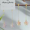 Pendientes largos de estrella de cinco puntas y flor de ciruelo pequeños y exquisitos sin perforación orejera clip para oreja largos colgantes muestran un encanto suave como de hada