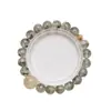 Pulsera de Cuarzo Fantasma Verde Natural para MujerVersátil Pulsera de Cristal de Cabello Platino de Alta Gama al por Mayor