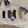 Calcetines sin pies de lana fina de color liso para otoño e invierno para mujer, calcetines de canalé sin pies estilo ins, calcetines apilables