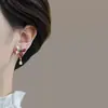 Pendientes de mariposa asimétricos con diseño único y sentido del nicho, pendientes colgantes de gota de agua súper brillantes de lujo y de alta gama, nuevos pendientes