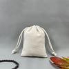 Bolsa de tela de algodón y lino al por mayor bolsa para guardar granos de arroz bolsa de embalaje con impresión publicitaria bolsa con cordón para joyería con texto