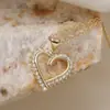 Aogu Moda Transfronteriza Lujo Accesible Chapado en Cobre Oro de 18 Quilates Circonita Colgante de Corazón Cadena para Clavícula para Mujer Nicho Gama Alta Collar Nuevo