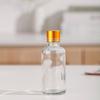 Venta al por mayor de fábrica botella de aceite de vidrio botella gotero con cabezal de arena botella de spray transparente botella de cosméticos portátil