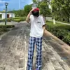 Pantalones de cuadros azules nuevos de verano para hombre y mujer, estilo fino, pantalones acampanados micro de la alta calle americana, pantalones deportivos casuales rectos