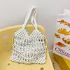 Bolsa de Ombro Tecida Colorida de Grande Capacidade Moda Verão 2026 Novo Estilo Bolsa de Axila de Rede Bolsa de Praia para Férias na Praia