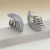 Pendientes Transfronterizos Personalizados de Moda con Textura Geométrica Espiral Hueca, Pendientes Irregulares Creativos de Moda para Mujer