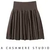 Falda de cachemira para mujer, otoño e invierno, elegante nueva falda corta plisada abullonada de cintura alta con cordón estilo ballet