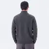 Nova coleção outono/inverno: cardigã de malha de lã de alta qualidade, com gola alta, caimento relaxado e fecho de zíper, exalando um estilo sofisticado e discreto.