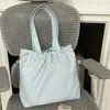 2026 Primavera Inicial Novo Estilo Preguiçoso Moda Versátil Bolinhas Cordão Bolsa de Mão Simples Casual Bolsa de Ombro para o Dia a Dia
