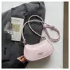 2026 Nova Bolsa Pequena Estilosa Versátil Moda Bolsa Transversal Bolsa de Ombro Bolsa Feminina Cor Sólida Tendência Estilosa Bolsa de Axila Tendência