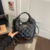 Bolso de hombro versátil de moda transfronterizo con un toque de alta gama, adecuado para ir al trabajo, bolso tipo cubo vintage, bolso de mano acolchado simple casual