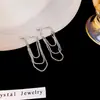 Pendientes Metálicos Retro Americanos de Cadena Larga con Borlas de Estilo Minimalista de Alta Gama 2023