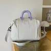 Bolsa de viaje portátil de gran capacidad para mujer para viajes cortos, bolso de mano, bolsa de equipaje resistente al agua, artículo popular de transmisión en vivo 2026