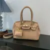 Bolsa de Mão com Padrão de Lichia Azul Nova Coleção Primavera 2026 Bolsa Platina Estilo Luxo Leve Bolsa Transversal Moda Versátil Bolsa para o Dia a Dia