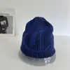Chapéu de Lã Tricotado Jacquard com Logo Grande Estilo Coreano para Rua para Homens e Mulheres Outono e Inverno Chapéu de Lã Quente para Proteção das Orelhas ao Ar Livre