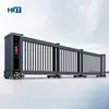 Puerta corrediza seccional eléctrica de aleación de aluminio, puerta corrediza seccional sin rieles, puerta recta, puerta retráctil automática para patio de fábrica escolar