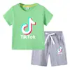 Camiseta infantil 2022 TikTok verano nueva ropa infantil de comercio exterior coreana pantalones cortos de manga corta para niños traje de dos piezas