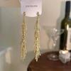 Aretes de Borla Plateados para Mujer, Diseño Nicho de Lujo Ligero, Puños para Oreja de Estilo Nuevo y Trendy 2025, Aretes Versátiles y Adelgazantes