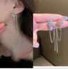 Aguja de plata 925 puesto mercado nocturno suministro aretes moda mujer asimétricos populares explosiones japonesas y coreanas aretes al por mayor A