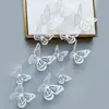 Decoración de mariposa de papel con simulación tridimensional 3D, accesorios de joyería de mariposa hueca tridimensional con textura metálica, pegatinas de pared para el hogar al por mayor