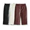 8258-26 Coleção de outono, cor sólida, corte justo, comprimento médio, calça casual com uma pequena fenda, estilo capri e textura semelhante a couro
