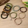 TEMU Xiyin producto nuevo transfronterizo estilo bohemio cuenta de madera de cáscara de coco pulsera elástica para hombre pulsera de muñeca