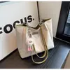 Bolsa Grande Capacidade Feminina Explosiva 2024 Nova Bolsa Tote Moda Super Popular Versátil Ombro Estudante Universitário Bolsa de Aula