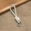 Bolsa de Corda de Couro PU Colorida Pingente Estilo Miu Simples Versátil Charme de Bolsa Chaveiro Acessório Lanyard de Celular Estilo Curto Novo